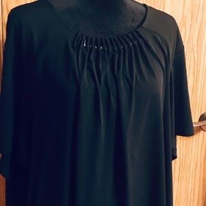 Pretty blouse with embellished neckline